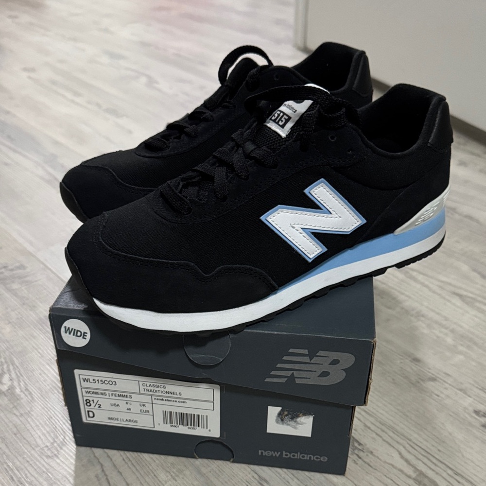 New Balance Black Sneakers with White and Light Blue Details